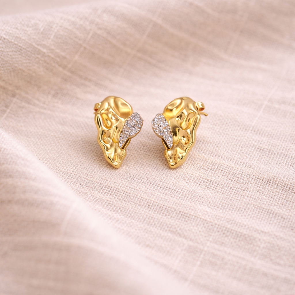 Deriva Earrings in a soft linen background