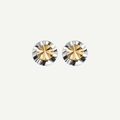 Pair of gold and silver stud earrings on a white background