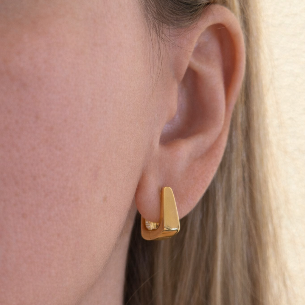Moderno hoops being worn by a blond model