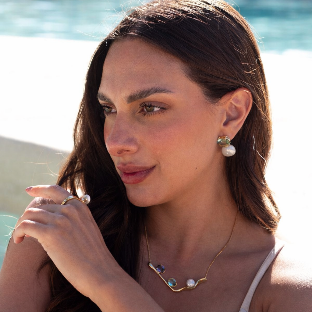 woman wearing oceano collection by the pool