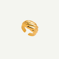 Croissant-shaped ring in a white background