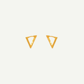 Gold triangle-shaped earrings on a light gray background