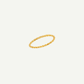 Gold ring with a twisted design on a light gray background