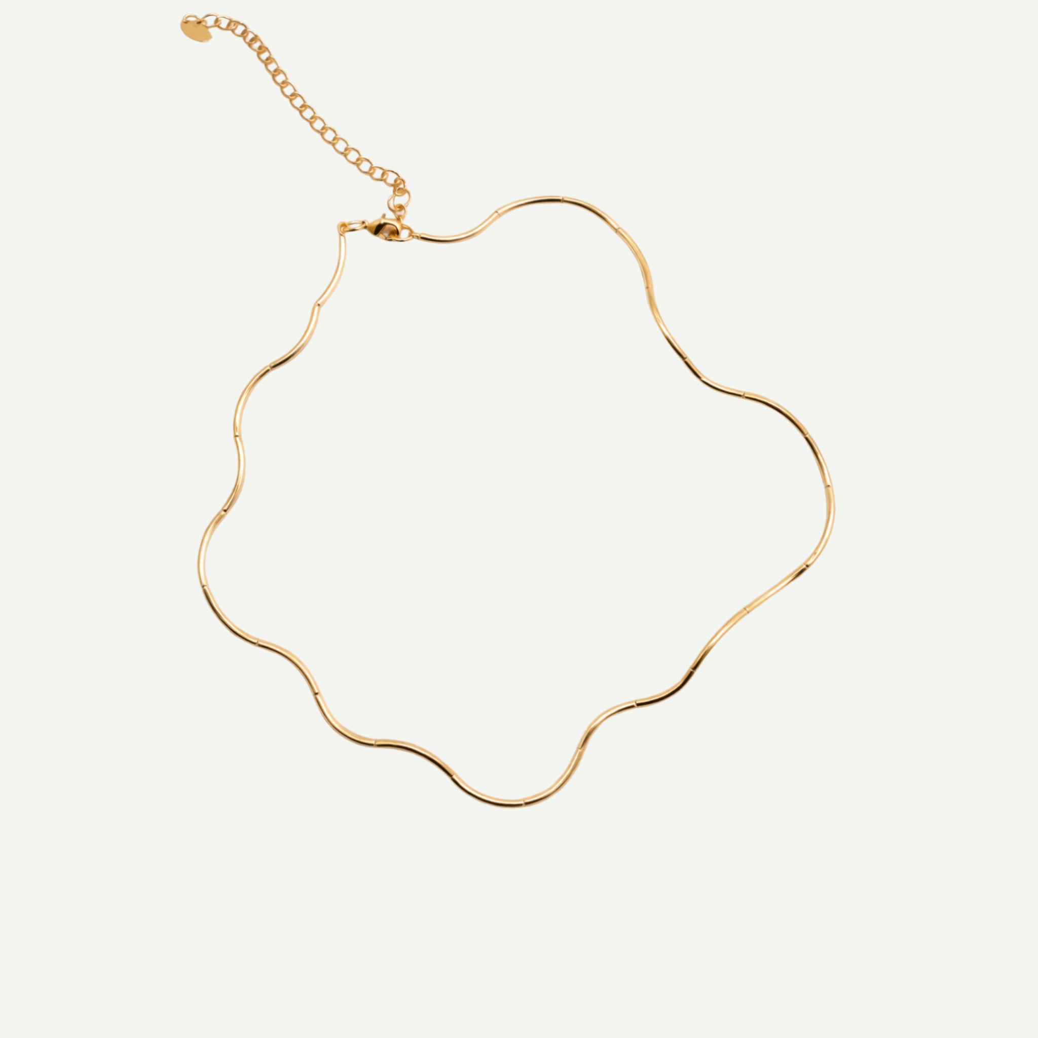 Gold necklace on a white background

